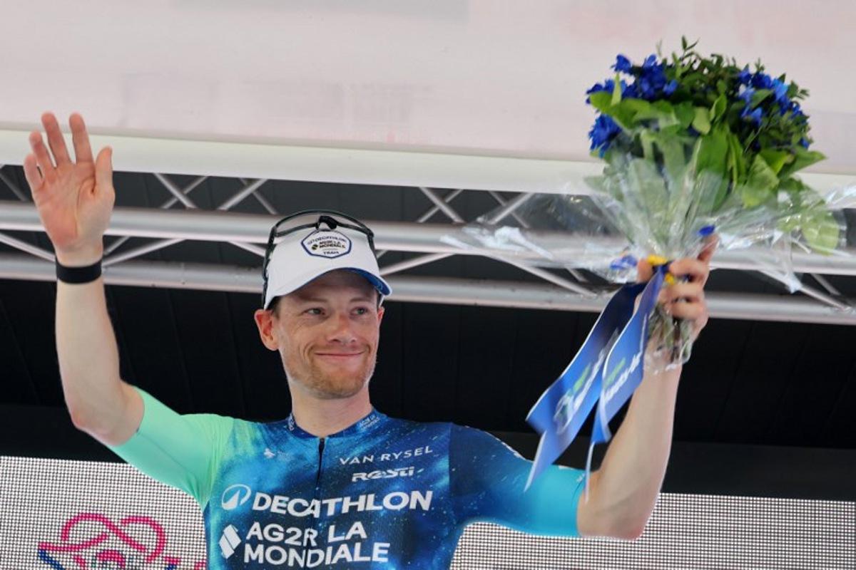 Decathlon AG2R La Mondiale's Irish rider Sam Bennett celebrates on the podium after winning the second stage of the "4 jours de Dunkerque" (Four days of Dunkirk) cycling race, 184 km from Wimereux to Abbeville, northern France, on May 15, 2024. FRANCOIS LO PRESTI / AFP