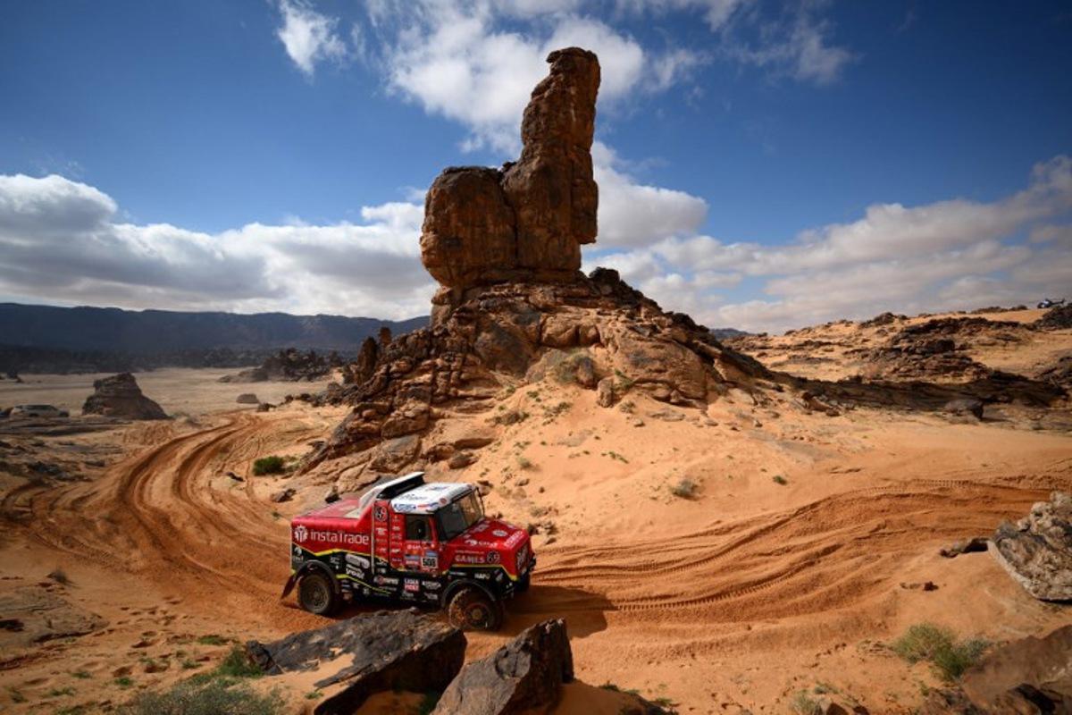 Czech truck driver Ales Loprais, co-driver Petr Pokora, and mechanic Jaroslav Valtr Jr compete during the fourth stage of the 2023 Dakar rally around Ha'il in Saudi Arabia on January 4, 2023. FRANCK FIFE / AFP