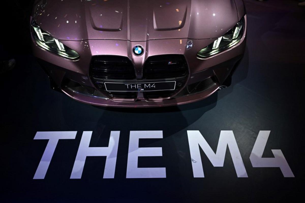 A BMW M4 is displayed at the Beijing Auto Show on April 29, 2024. Pedro PARDO / AFP