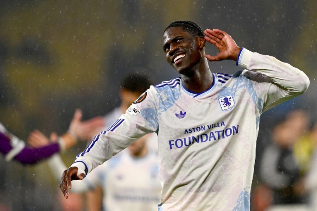Aston villa's Belgian midfielder #24 Amadou Onana celebrates after winning the Europa League 1st round day 7 football match between Fenerbahce and Aston Villa at Sukru Saracoglu Stadium in Istanbul on January 22, 2026. Yasin AKGUL / AFP