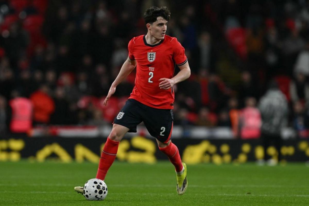 England's defender Tino Livramento looks to play a pass during the friendly International football match between England and Uruguay at Wembley Stadium, west London, on March 27, 2026. Glyn KIRK / AFP