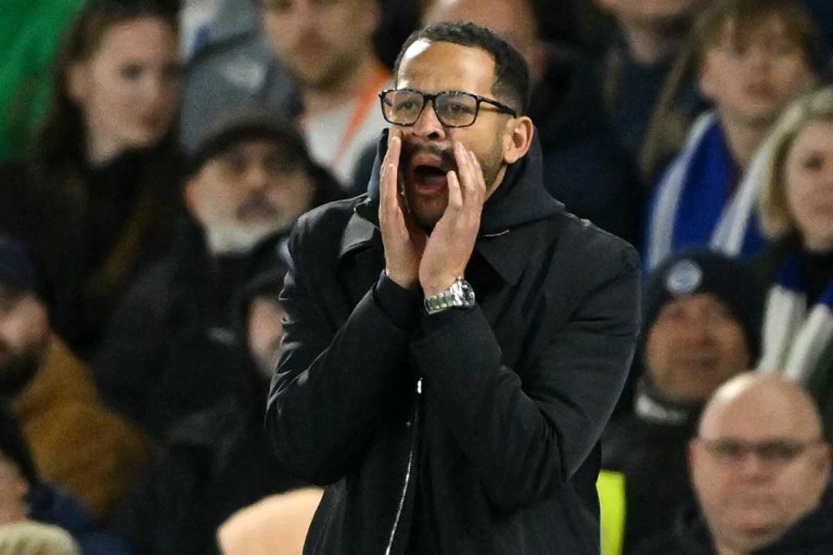 Chelsea's English head coach Liam Rosenior gestures on the touchline during the English Premier League football match between Brighton and Hove Albion and Chelsea at the American Express Community Stadium in Brighton, southern England on April 21, 2026. Glyn KIRK / AFP