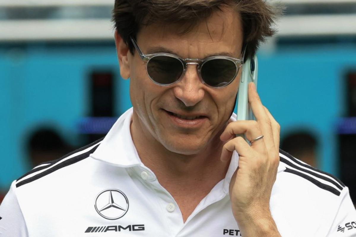 Mercedes' Austrian team principal and CEO Toto Wolff talks on the phone as he arrives for the 2025 Miami Formula One Grand Prix at Miami International Autodrome in Miami Gardens, Florida, on May 4, 2025. CHARLY TRIBALLEAU / AFP