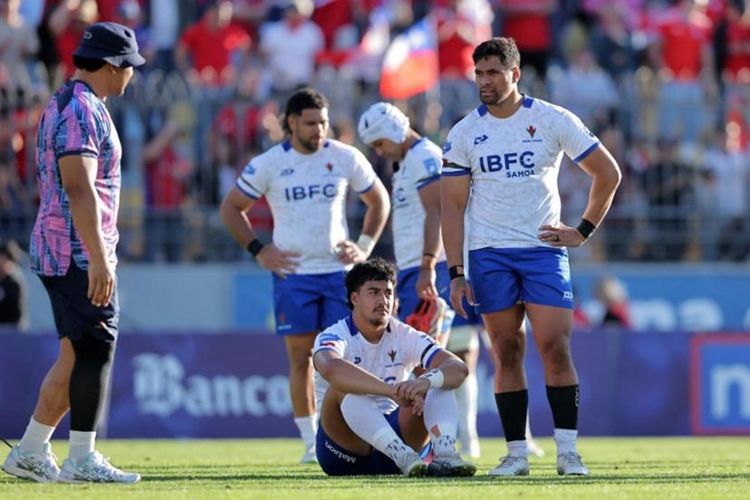 Samoa's players react after losing the Rugby World Cup Qualifying 2025 match between Chile and Samoa at the Sausalito Stadium in Vina del Mar, Chile, on September 27, 2025. Javier TORRES / AFP