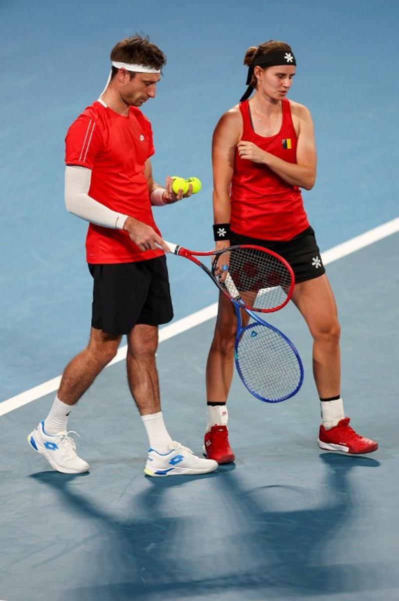 Belgium's Sander Gille (L) and Greet Minnen prepare to serve to Czech Republic's Linda Fruhvirtova and Dalibor Svrcina during their mixed-doubles quarter-final match at the United Cup tennis tournament at Ken Rosewall Arena in Sydney on January 8, 2026. Izhar KHAN / AFP