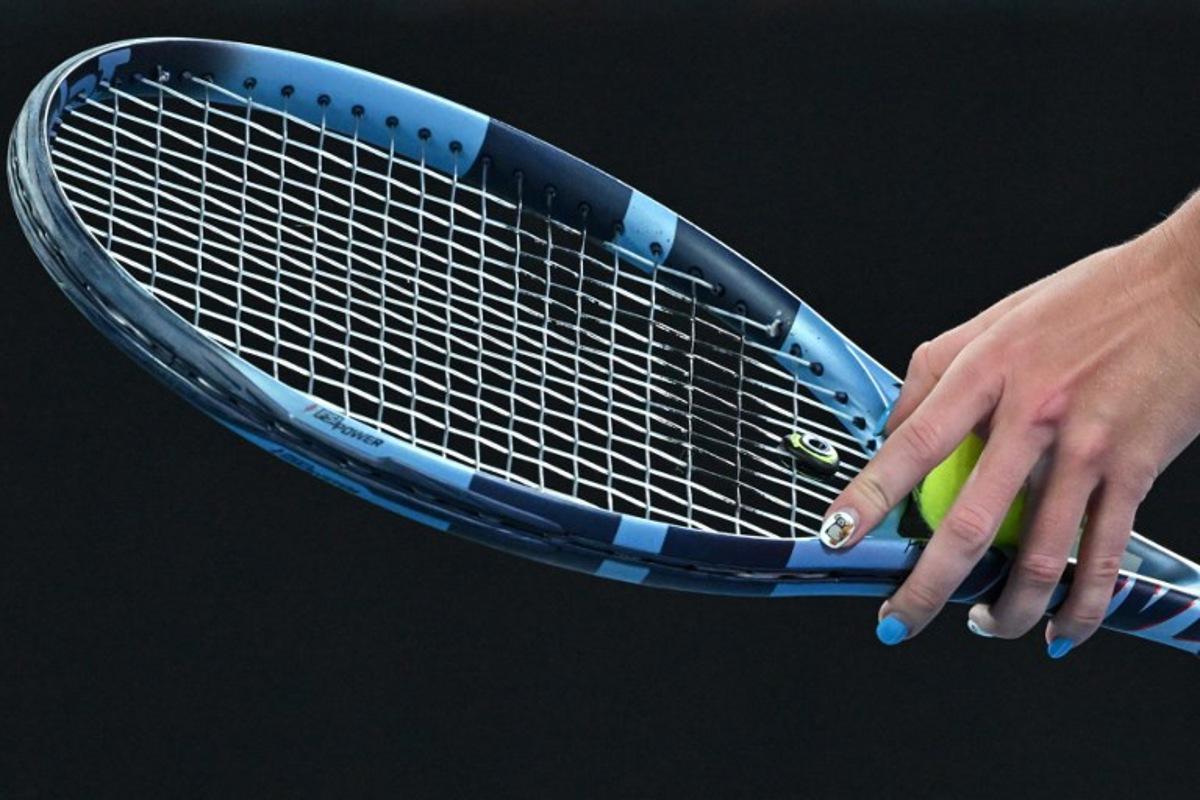 Czech Republic's Nikola Bartunkova serves against Belgium's Elise Mertens during their women's singles match on day seven of the Australian Open tennis tournament in Melbourne on January 24, 2026. Paul Crock / AFP