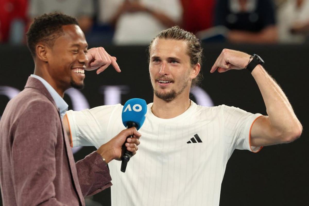 Germany's Alexander Zverev speaks to media after defeating USA's Learner Tien in his men's singles quarter-final match on day ten of the Australian Open tennis tournament in Melbourne on January 27, 2026. DAVID GRAY / AFP