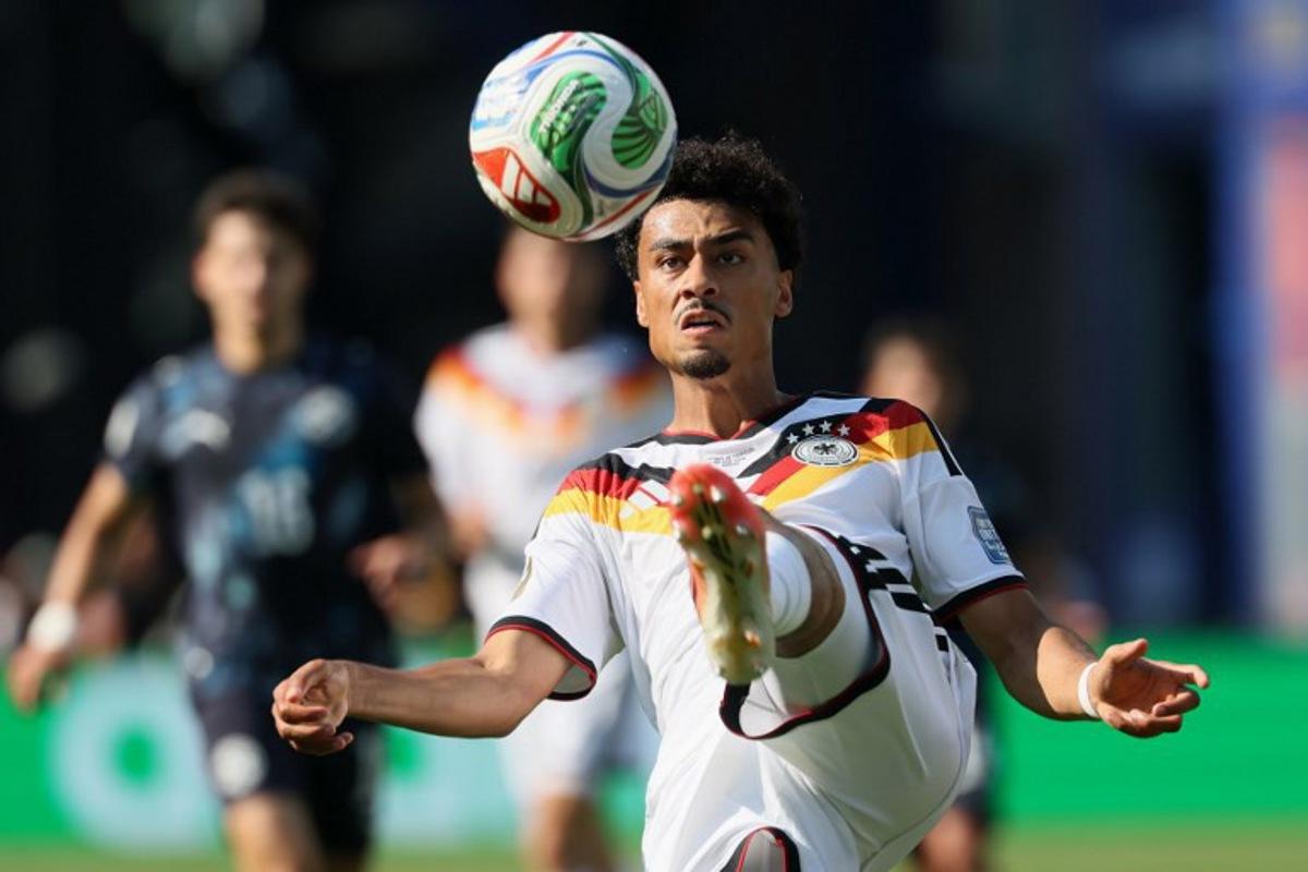 Germany's defender #18 Nathaniel Brown kicks the ball during the 2026 World Cup round of 32 football match between Germany and Paraguay at the Boston Stadium in Foxborough on June 29, 2026. Odd ANDERSEN / AFP