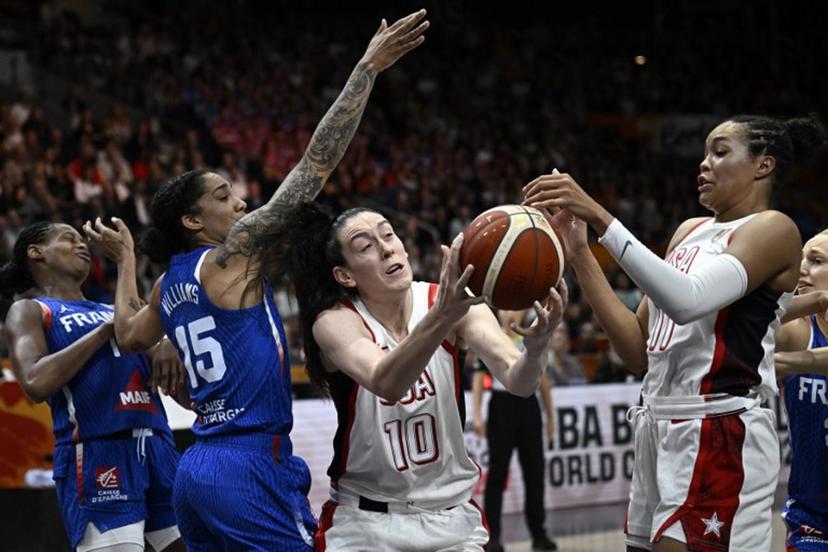 France's forward #15 Gabby Williams and USA's power forward #10 Breanna Stewart vie for the ball during the 2026 FIBA Women's Basketball World Cup final game between the United States and France in Berlin on September 13, 2026. Tobias SCHWARZ / AFP