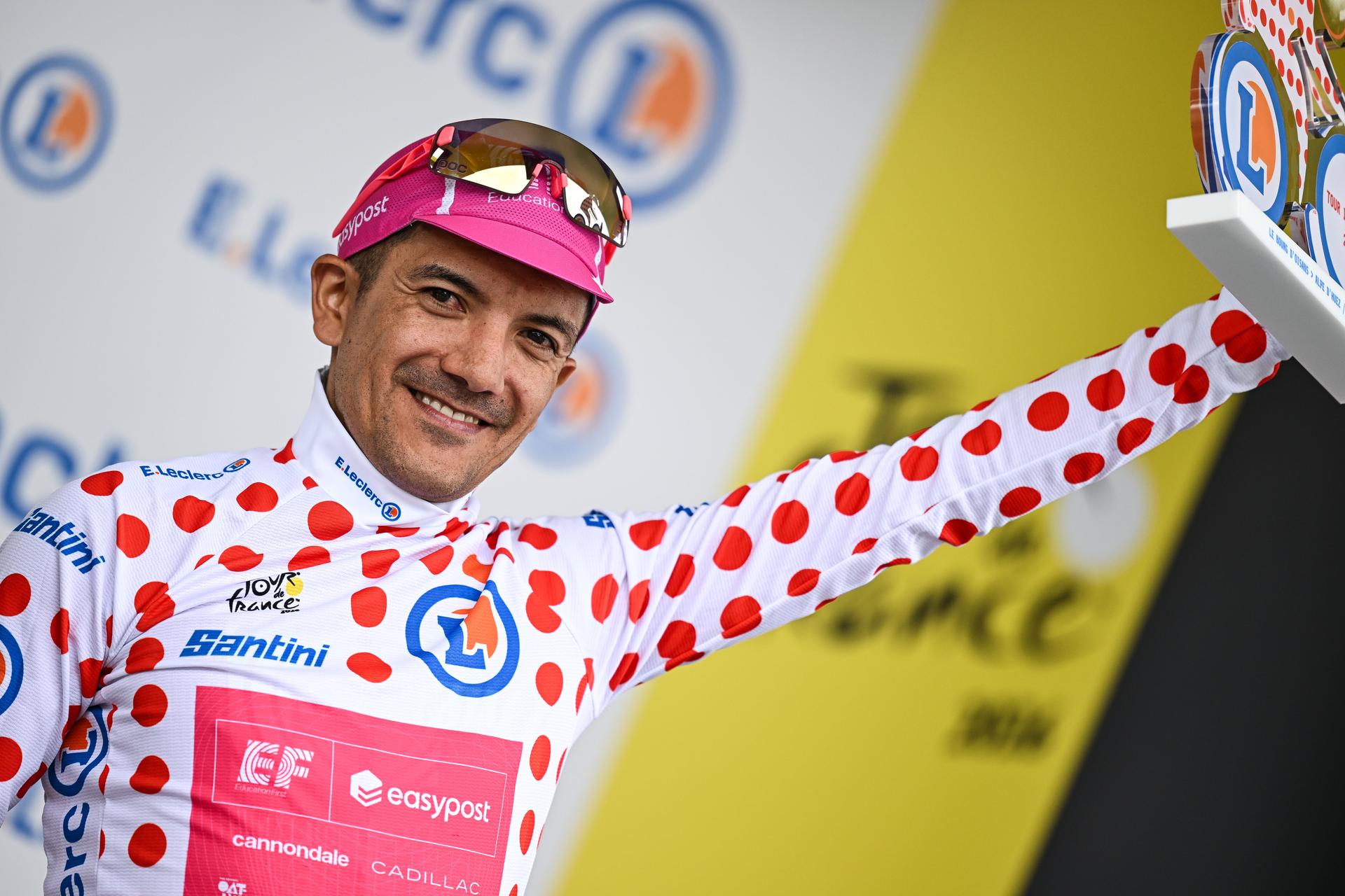 Ecuadorian Richard Carapaz of EF Education-EasyPost celebrates on the podium in the red polka-dot jersey for best climber after stage 20 of the 2026 Tour de France cycling race, a stage of 171km Le Bourg d'Oisans to Alpe d'Huez, on Saturday 25 July 2026. The 113th edition of the Tour de France starts on Saturday 4 July in Barcelona, Spain, and will finish in Paris, France on the 26th of July. BELGA PHOTO DAVID PINTENS