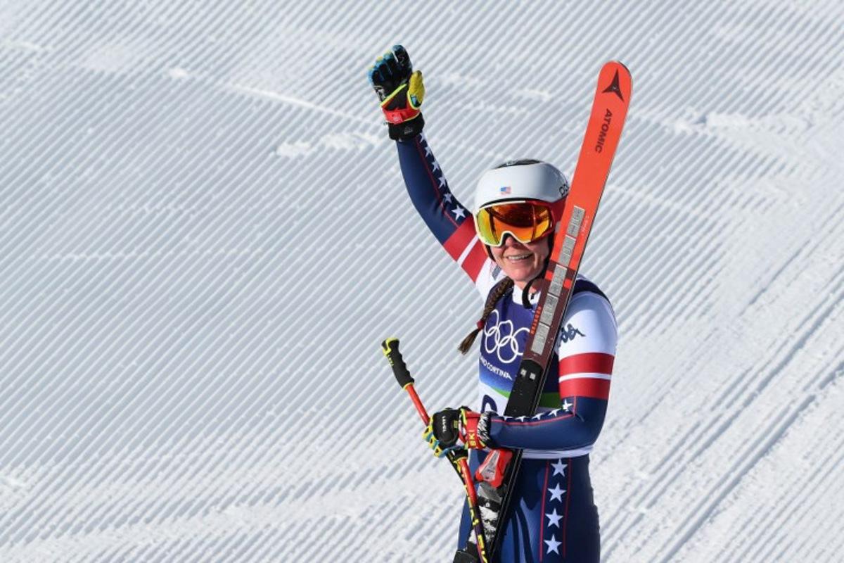US' Breezy Johnson reacts in the finish area of the women's downhill event during the Milano Cortina 2026 Winter Olympic Games at the Tofane Alpine Skiing Centre in Cortina d'Ampezzo on February 8, 2026. Marco BERTORELLO / AFP