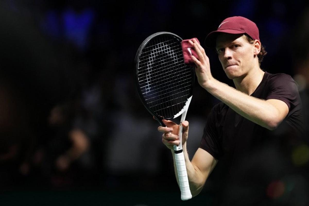 Italy's Jannik Sinner celebrates after winning against Argentine's Francisco Cerundolo following their men's singles match on day four of the Paris ATP Masters 1000 tennis tournament at the Paris La Défense Arena in Nanterre, on the outskirts of Paris, on October 30, 2025. Dimitar DILKOFF / AFP