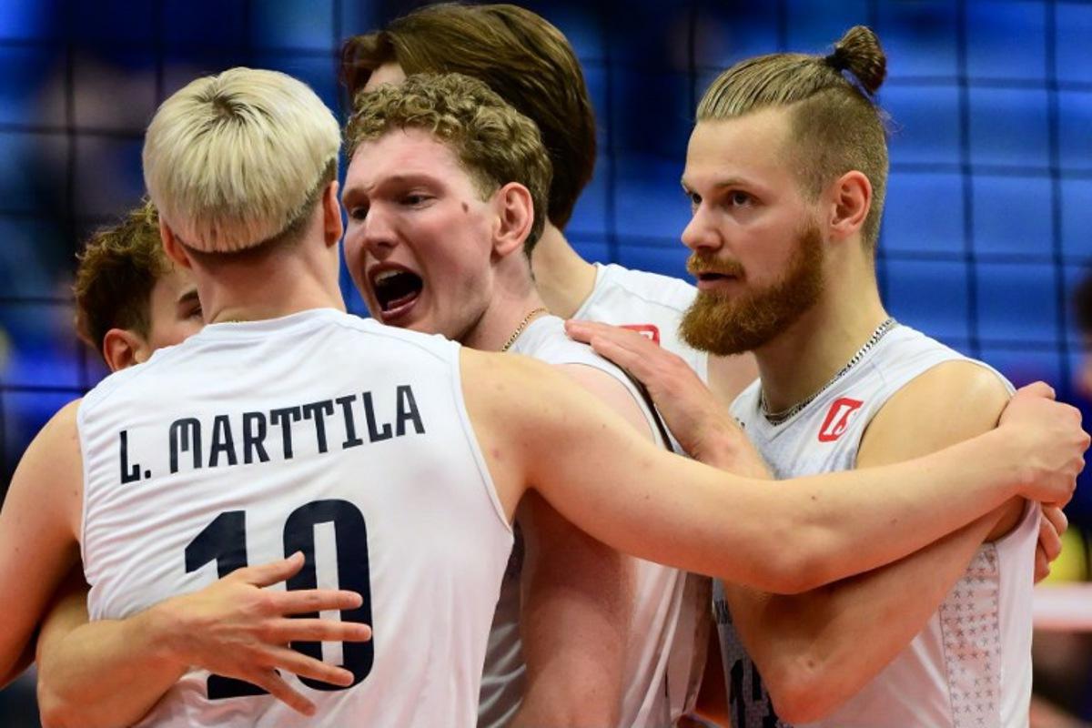 Finland's Fedor Ivanov (C) celebrates after scoring during the CEV EuroVolley 2026 men's quarterfinal volleyball match between Italy and Finland at the Palavela in Turin on September 23, 2026. Marco BERTORELLO / AFP