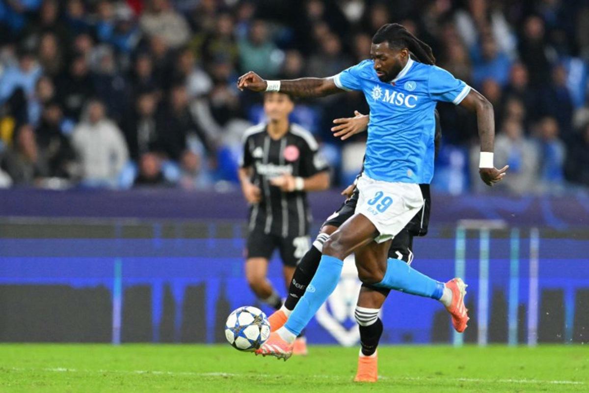 Napoli's Cameroonian midfielder #99 Andre-Frank Anguissa controls the ball during the UEFA Champions League - league phase day 4 football match between Napoli and Eintracht Frankfurt at the Diego Armando Maradona stadium in Naples on November 4, 2025. Andreas SOLARO / AFP