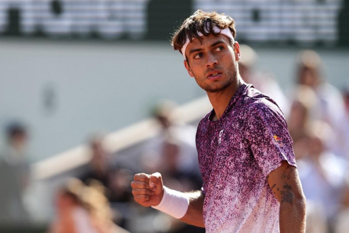 Italy's Flavio Cobolli reacts after a point as he plays against during his men's final singles match against Germany's Alexander Zverev on day 15 of the French Open tennis tournament on Court Philippe-Chatrier at the Roland-Garros Complex in Paris on June 7, 2026. Dimitar DILKOFF / AFP
