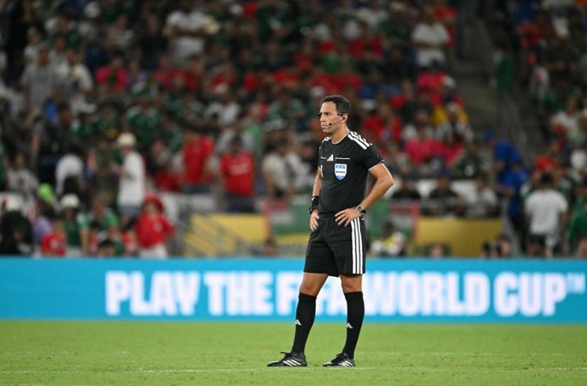 Argentine referee Facundo Tello officiates during the 2026 World Cup Group A football match between South Africa and South Korea at the Monterrey Stadium in Guadalupe, Mexico, on June 24, 2026. Yuri CORTEZ / AFP
