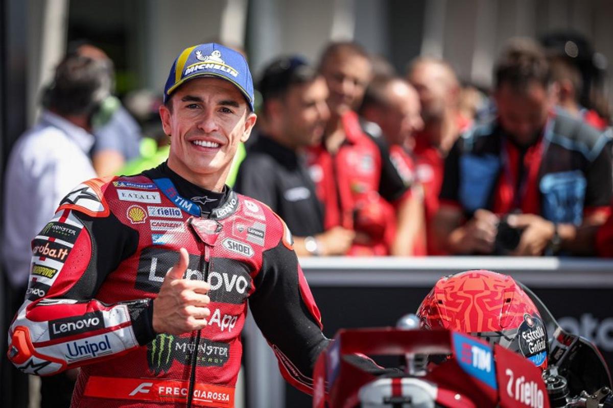 Ducati Lenovo Team's Spanish MotoGP rider Marc Marquez reacts after winning the qualifiying session of the German Motorcycle MotoGP Grand Prix at the Sachsenring race track in Hohenstein-Ernstthal near Chemnitz, eastern Germany, on July 11, 2026. Ronny HARTMANN / AFP