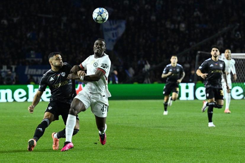 Qarabag's Cape Verdean midfielder #15 Leandro Andrado and Chelsea's Belgian midfielder #45 Romeo Lavia vie for the ball during the UEFA Champions League league phase football match between Qarabag and Chelsea at the Tofiq Bahramov Republican Stadium in Baku on November 5, 2025. Tofik BABAYEV / AFP