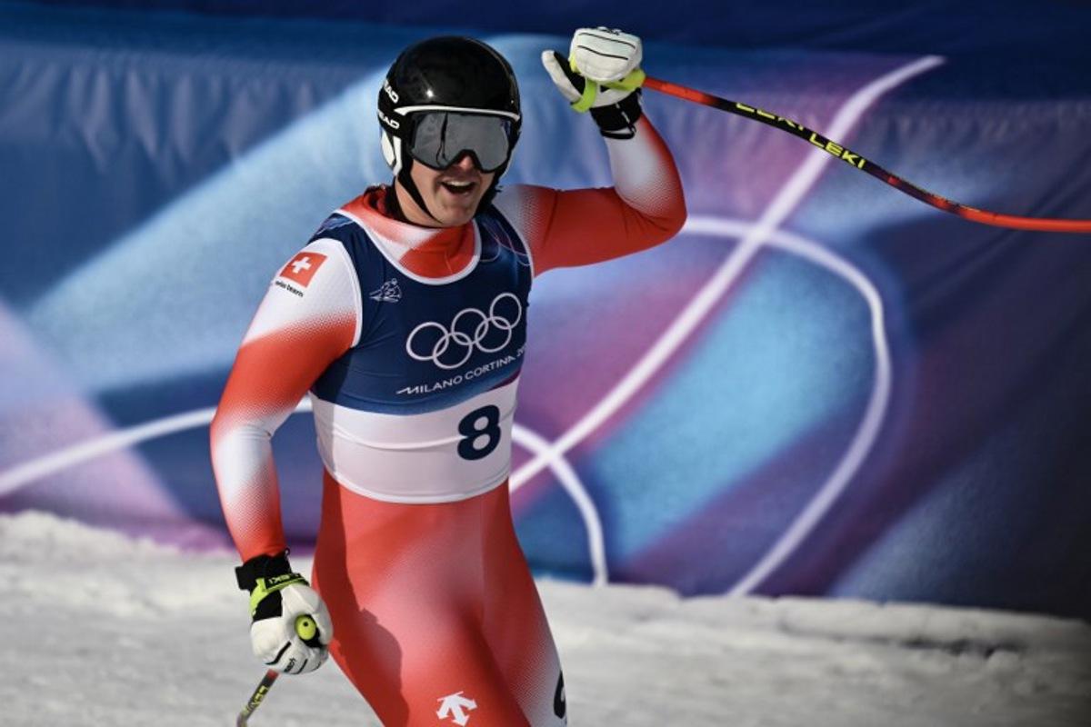 Switzerland's Franjo von Allmen reacts in the finish area after competing in the men's downhill alpine skiing event during the Milano Cortina 2026 Winter Olympic Games at the Stelvio Ski Centre in Bormio (Valtellina) on February 7, 2026. Jeff PACHOUD / AFP