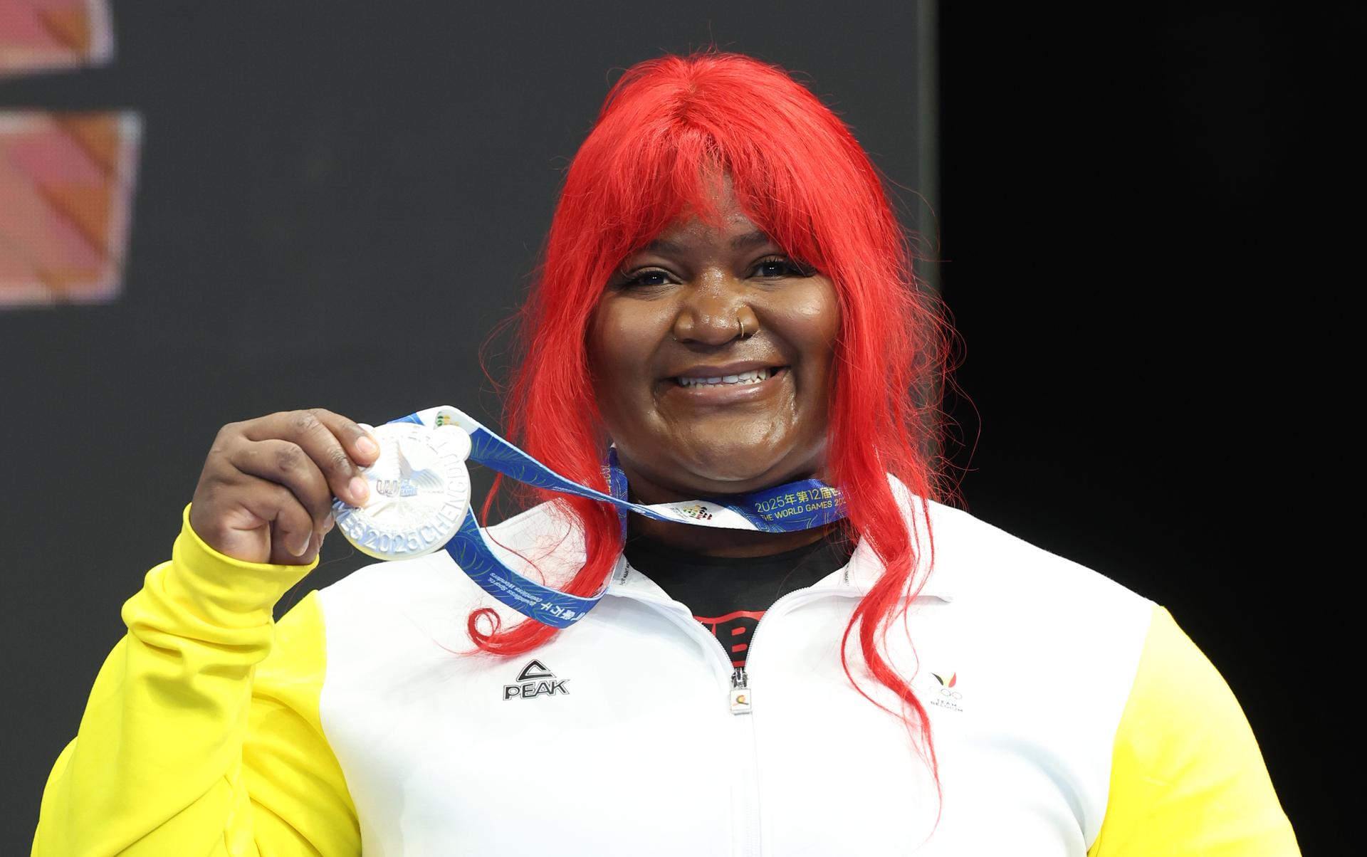 Belgian Sonita Muluh celebrates on the podium after winning silver medal at the super Heavyweight powerlifting event at the 2025 World Games, in Chenghdu, China, on Friday 15 August 2025. This year, the World Games take place from 7 to 17 August. BELGA PHOTO VIRGINIE LEFOUR