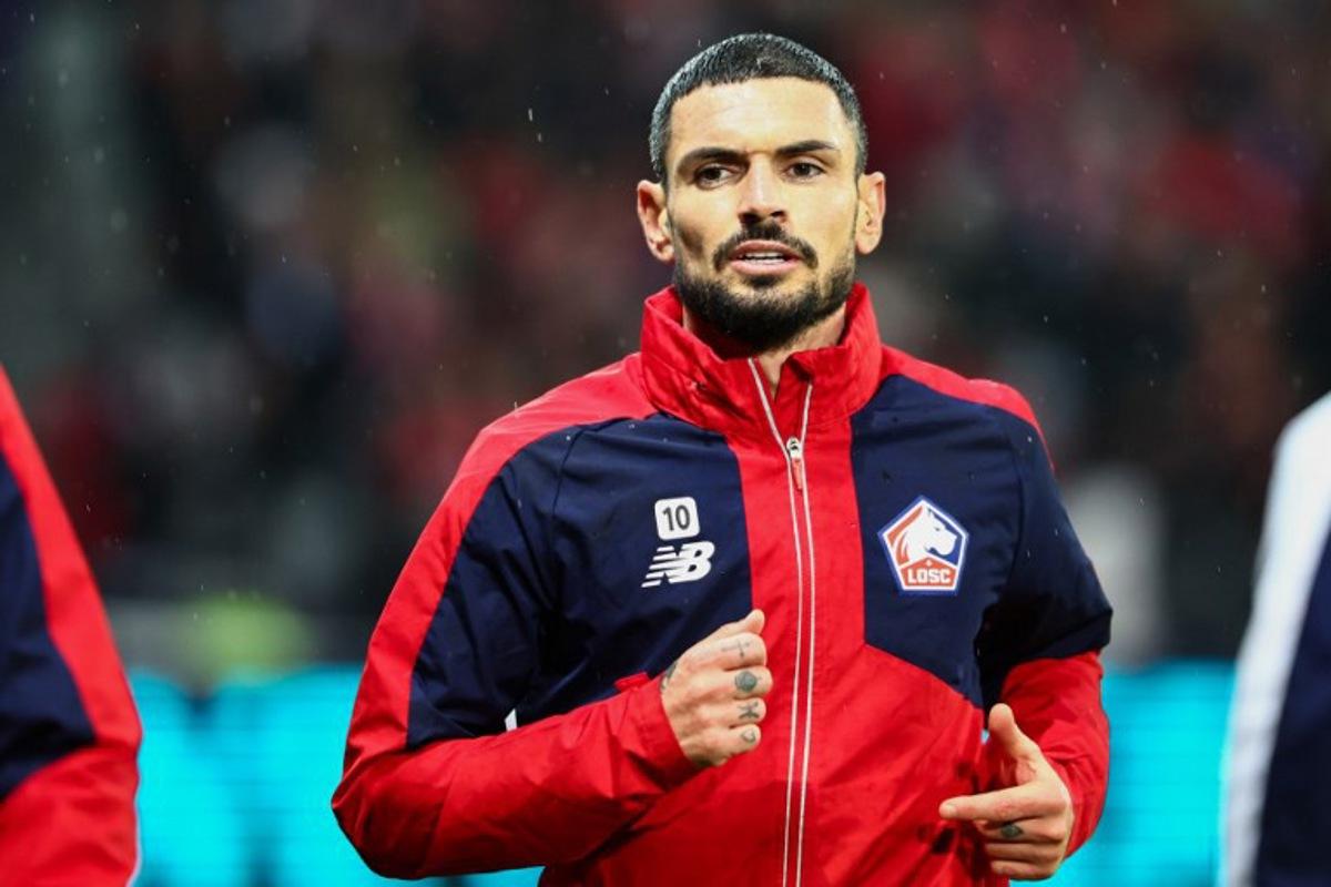 Lille's French midfielder #10 Remy Cabella warms up prior to the UEFA Champions League, league phase - matchday 8 football match between Lille OSC (LOSC) and Feyenoord Rotterdam at the Stade Pierre-Mauroy in Villeneuve-d'Ascq in Northern France, on January 29, 2025. Sameer Al-Doumy / AFP