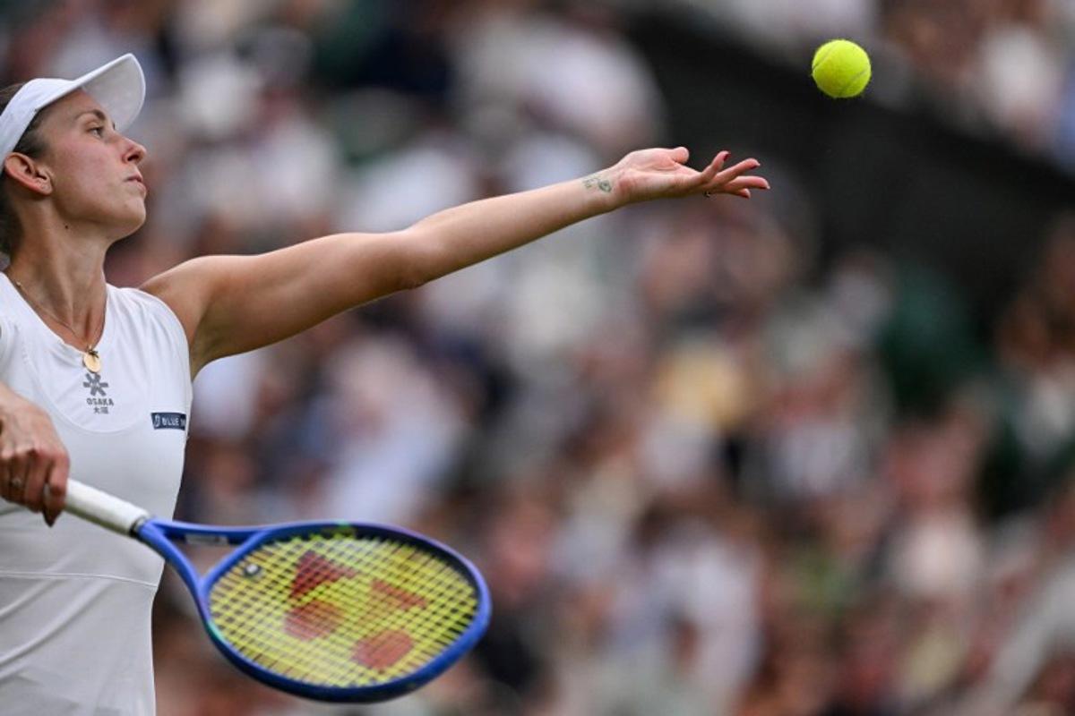 Belgium's Elise Mertens serves to Belarus's Aryna Sabalenka during their women's singles fourth round tennis match on the seventh day of the 2025 Wimbledon Championships at The All England Lawn Tennis and Croquet Club in Wimbledon, southwest London, on July 6, 2025. Kirill KUDRYAVTSEV / AFP
