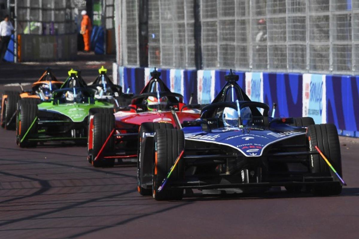 Maserati MSG Racing's driver Maximilian Gunther races ahead of Nissan's driver Sacha Fenestraz (C) and Envision Racing's driver Nick Cassidy (L) during the 2023 Cape Town E-Prix in Cape town on February 25, 2023. Rodger Bosch / AFP