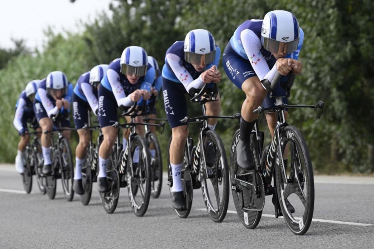 Team Israel Premier Tech 's riders compete during the fifth stage of La Vuelta a Espana cycling tour, a 24.1 km time-trial team race in Figueres, on August 27, 2025. Josep LAGO / AFP