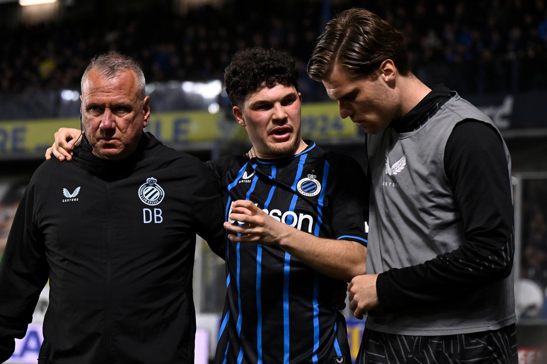 Club's Kyriani Sabbe and looks injured during a soccer match between Sint-Truiden VV and Club Brugge, Saturday 11 April 2026 in Sint-Truiden, on the second day of the Champion's Play-offs of the 2025-2026 'Jupiler Pro League' first division of the Belgian championship. BELGA PHOTO JOHAN EYCKENS