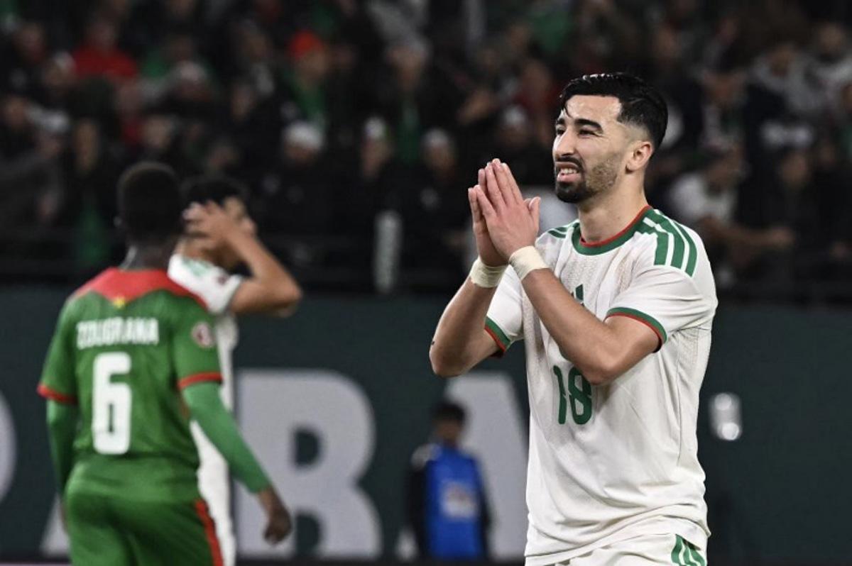 Algeria's forward #18 Mohamed Amoura (R) gestures during the Africa Cup of Nations (CAN) Group E football match between Algeria and Burkino Faso at Moulay Hassan Stadium in Rabat on December 28, 2025. Paul ELLIS / AFP