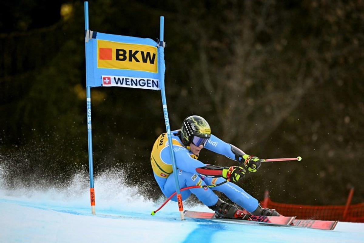 Italy's Giovanni Franzoni competes in the FIS alpine skiing Men's World Cup Super G event in Wengen, Swiss Alps, on January 16, 2026. Fabrice COFFRINI / AFP