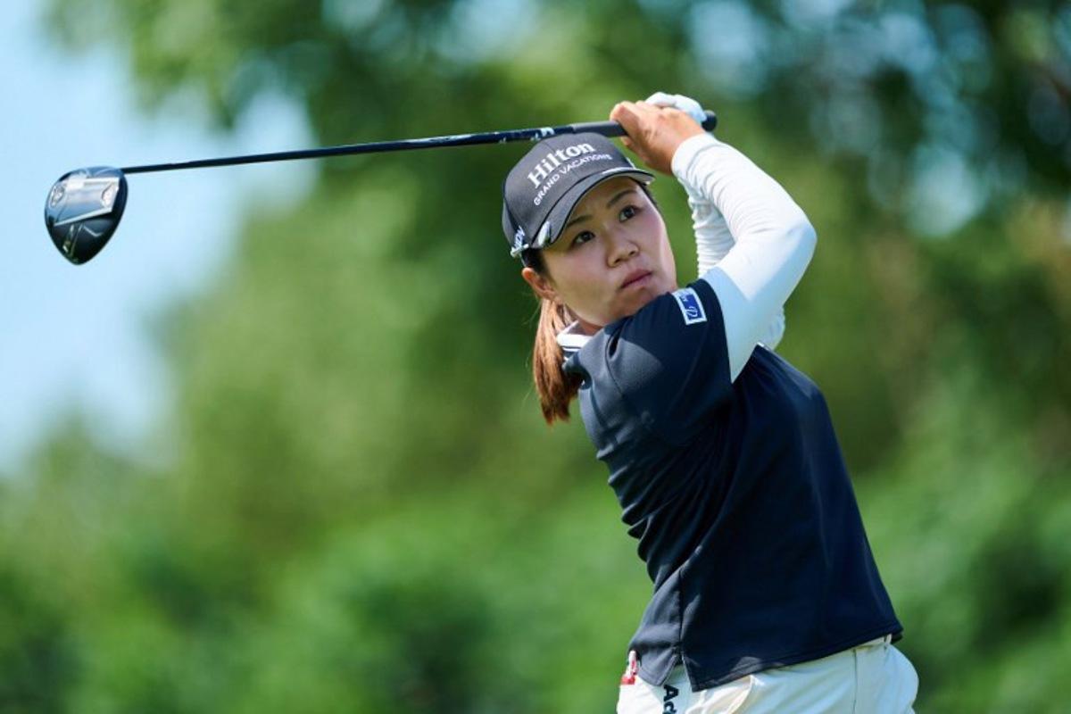 Japan's Nasa Hataoka plays a shot during the Shanghai LPGA golf tournament in Shanghai on October 9, 2025. STR / AFP
