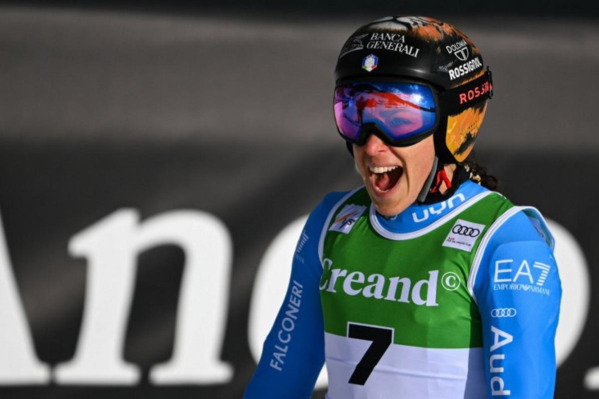 Italy's Federica Brignone reacts after crossing the finish line of the women's super G race, part of the FIS Alpine Ski World Cup 2025-2026 in Soldeu on March 1, 2026. Lionel BONAVENTURE / AFP
