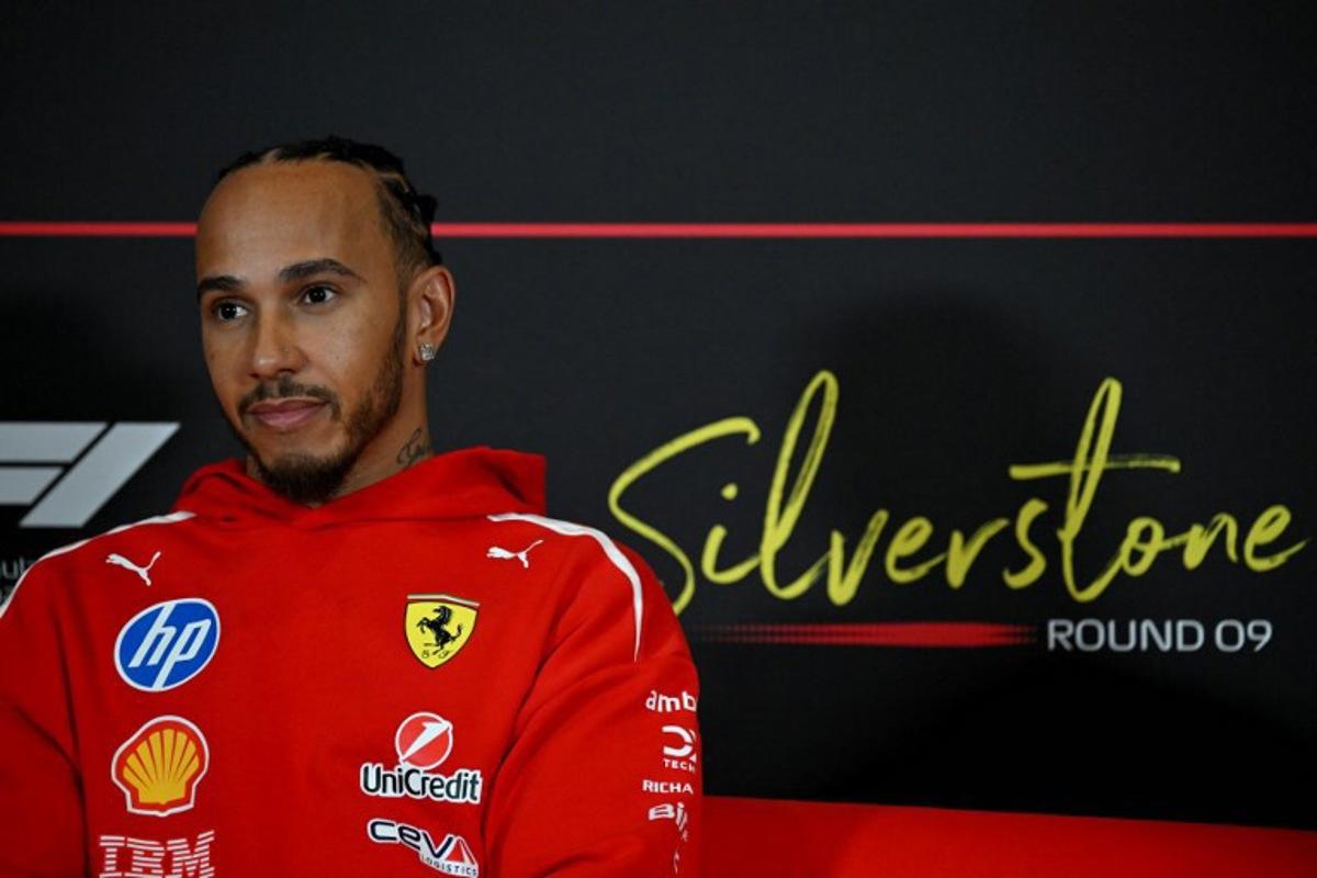 Ferrari's British driver Lewis Hamilton attends a press conference ahead of the Formula One British Grand Prix at the Silverstone motor racing circuit in Silverstone, central England, on July 2, 2026. Andrej ISAKOVIC / AFP