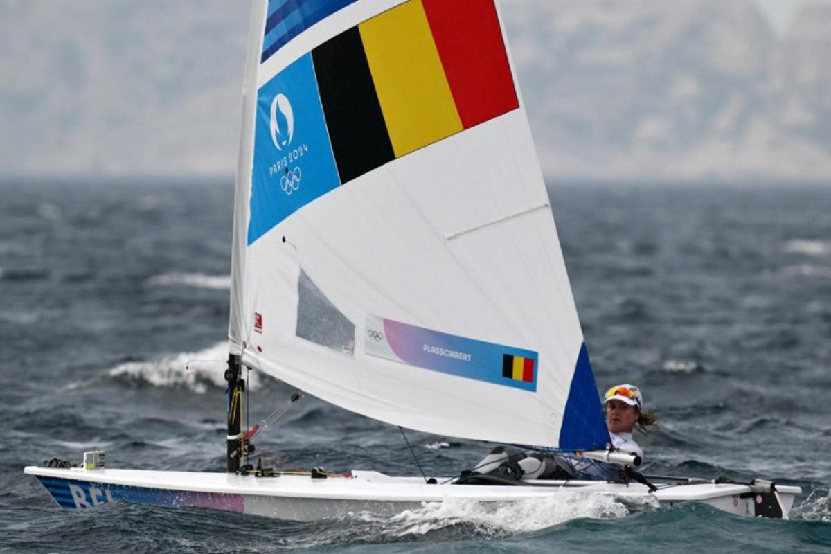 Belgium's Emma Plasschaert competes in the medal race of the women's ILCA 6 single-handed dinghy event during the Paris 2024 Olympic Games sailing competition at the Roucas-Blanc Marina in Marseille on August 7, 2024. Christophe SIMON / AFP