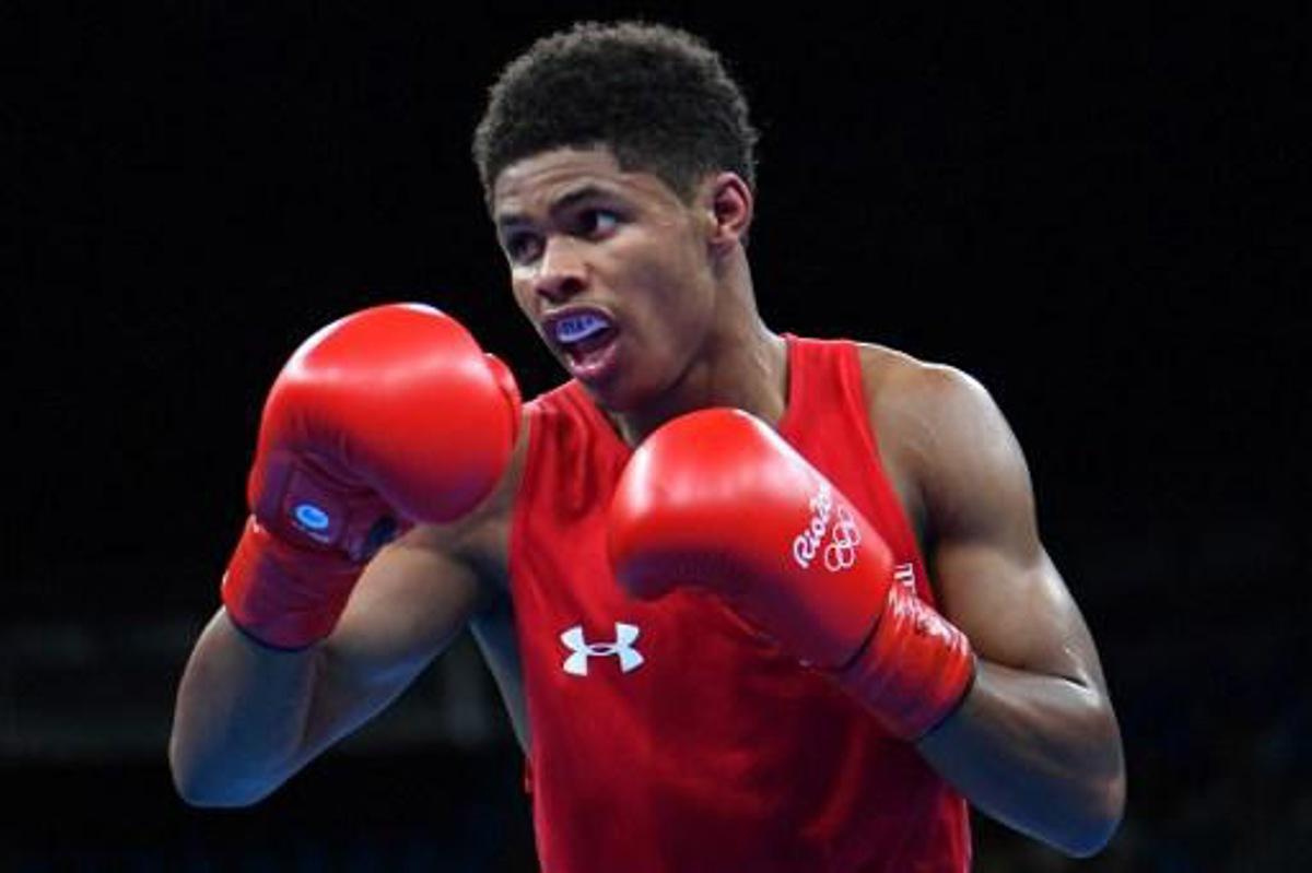 USA's Shakur Stevenson (red) fights Cuba's Robeisy Ramirez (blue) during the Men's Bantam (56kg) Final Bout at the Rio 2016 Olympic Games at the Riocentro - Pavilion 6 in Rio de Janeiro on August 20, 2016.
Yuri CORTEZ / AFP