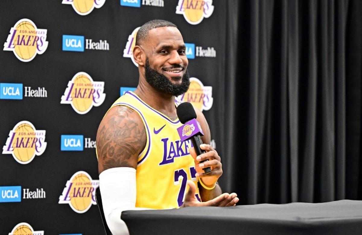 Los Angeles Lakers #23 LeBron James speaks to the press during the Lakers media day at UCLA Health Training Center in El Segundo, California, September 30, 2024. Frederic J. BROWN / AFP