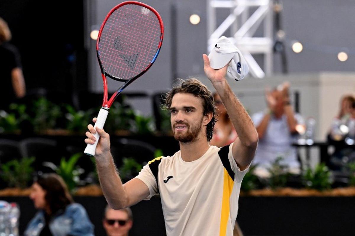 Czech Republic's Tomas Machac celebrates a match point against the USA's Tommy Paul during their men's singles semi-final match at the Adelaide International tennis tournament in Adelaide on January 16, 2026. Michael ERREY / AFP