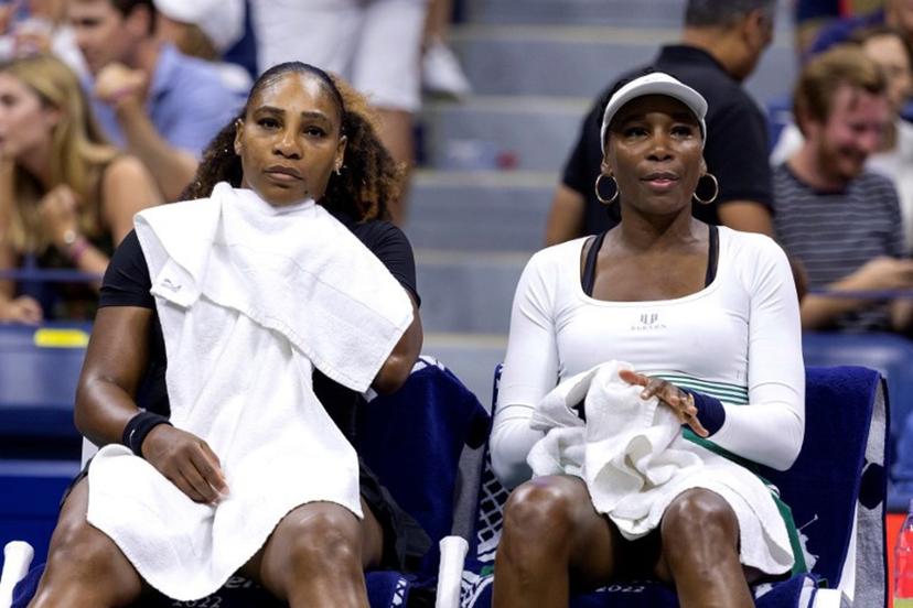 USA's Serena Williams (L) and Venus Williams sit on the bench between games as they play against Czech Republic's Lucie Hradecka and Linda Noskova during their 2022 US Open Tennis tournament women's doubles first round match at the USTA Billie Jean King National Tennis Center in New York, on September 1, 2022. COREY SIPKIN / AFP