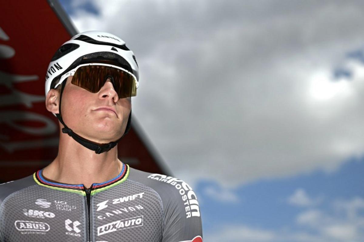 Guest and Alpecin - Deceuninck team's Dutch rider Mathieu van der Poel awaits the start of the 15th stage of the 112th edition of the Tour de France cycling race, 169.3 km between Muret and Carcassonne, southwestern France, on July 20, 2025. Loic VENANCE / AFP