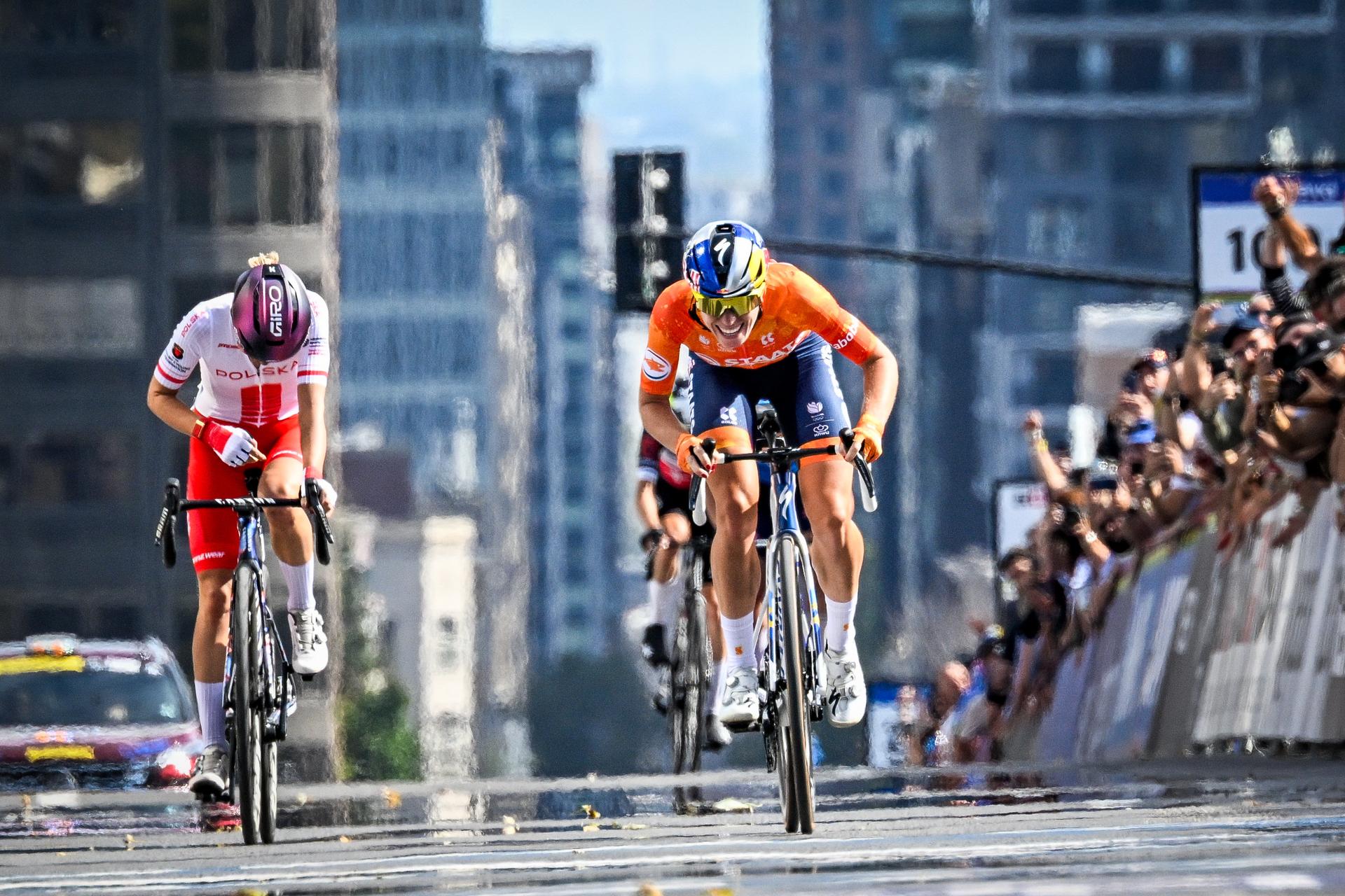Dutch Demi Vollering celebrates as she crosses the finish line to win the elite women Road Race race (180,4 km) at the cycling World Championship, in Montreal, Canada, Saturday 26 September 2026. The UCI road world championships are taking place from 20 to 27 September, in Montreal, Canada. BELGA PHOTO JASPER JACOBS