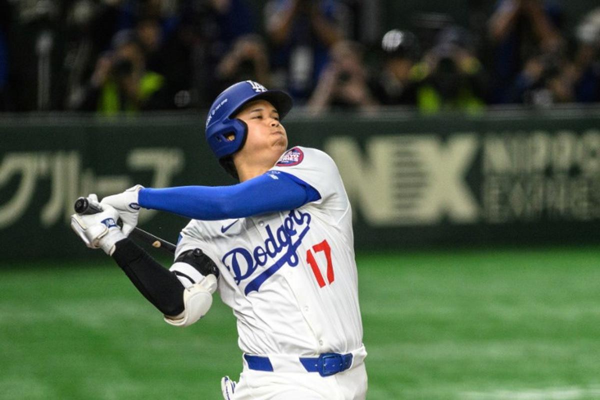 LA Dodgers' Shohei Ohtani bats during the baseball game between the Los Angeles Dodgers and Chicago Cubs in the MLB Tokyo Series at the Tokyo Dome in Tokyo on March 19, 2025. Philip FONG / AFP
