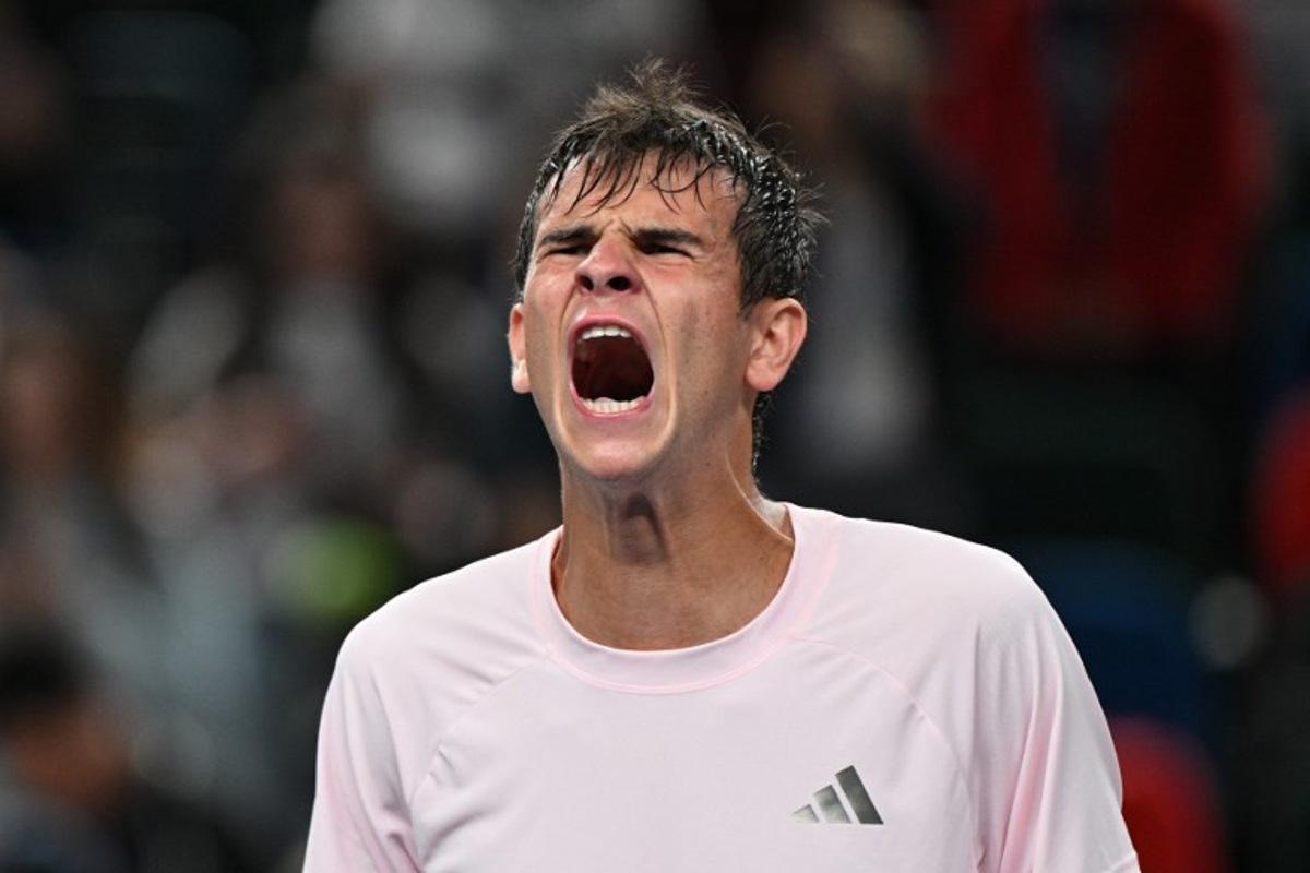 Spain's Rafael Jodar celebrates his victory against Norway's Casper Ruud during their men's singles quarter-final match at the Shanghai Masters tennis tournament in Shanghai on October 16, 2026. Hector RETAMAL / AFP