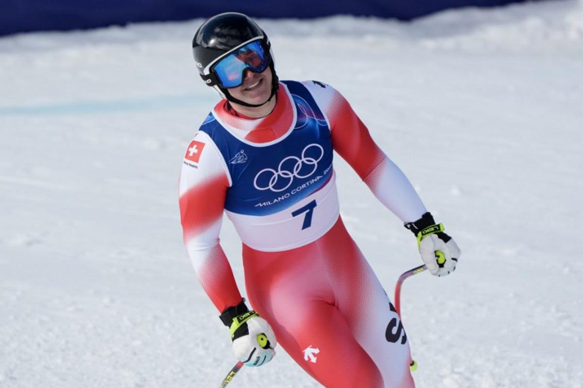 Switzerland's Franjo von Allmen reacts in the finish area of the men's super-G alpine skiing event during the Milano Cortina 2026 Winter Olympic Games at the Stelvio Ski Centre in Bormio (Valtellina) on February 11, 2026. Dimitar DILKOFF / AFP