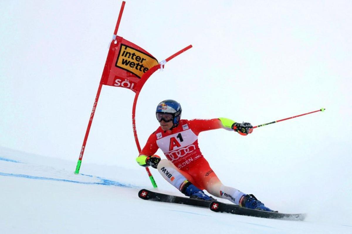 Switzerland's Marco Odermatt competes during the first run of the men's giant slalom at the Alpine Ski World Cup opener in Solden on October 26, 2025. Johann GRODER / APA / AFP