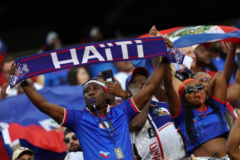 Haiti fans cheer ahead of the 2026 World Cup Group C football match between Haiti and Scotland at the Boston Stadium in Foxborough on June 13, 2026. FRANCK FIFE / AFP