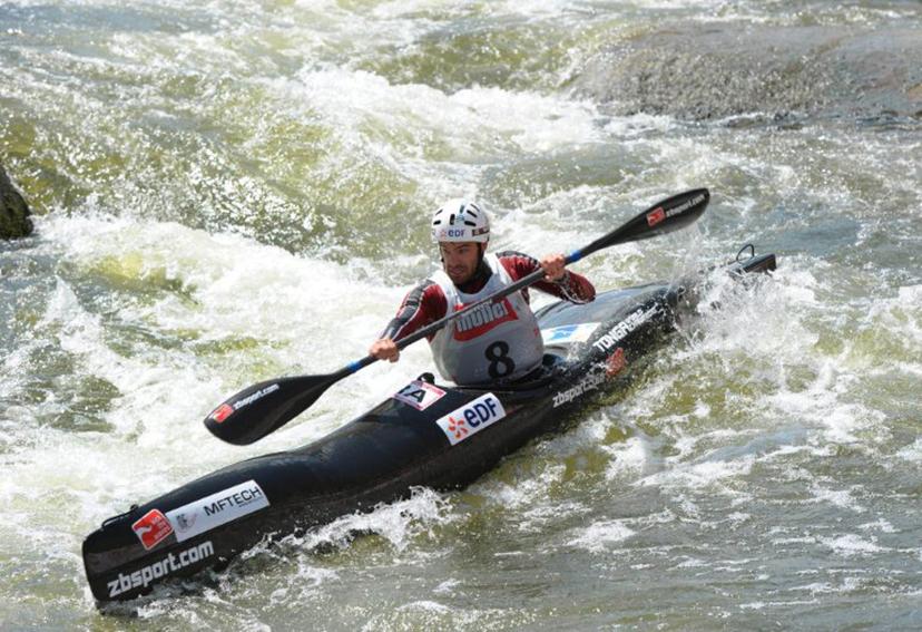 French Theo Devard competes in the Kayak K1 men race at the ICF Wildwater Canoeing Sprint World in the southern German city of Augsburg, on June 12, 2011. AFP PHOTO/CHRISTOF STACHE CHRISTOF STACHE / AFP