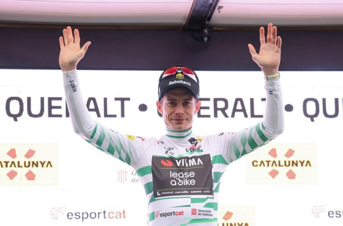 Team Visma-Lease a bike's Danish rider Jonas Vingegaard celebrates on the podium after winning the sixth stage of the 2026 'Volta a Catalunya' cycling tour of Catalonia, a 158 km race between Berga and the Sanctuary of La Mare de Deu de Queralt in Berga, on March 28, 2026. Josep LAGO / AFP