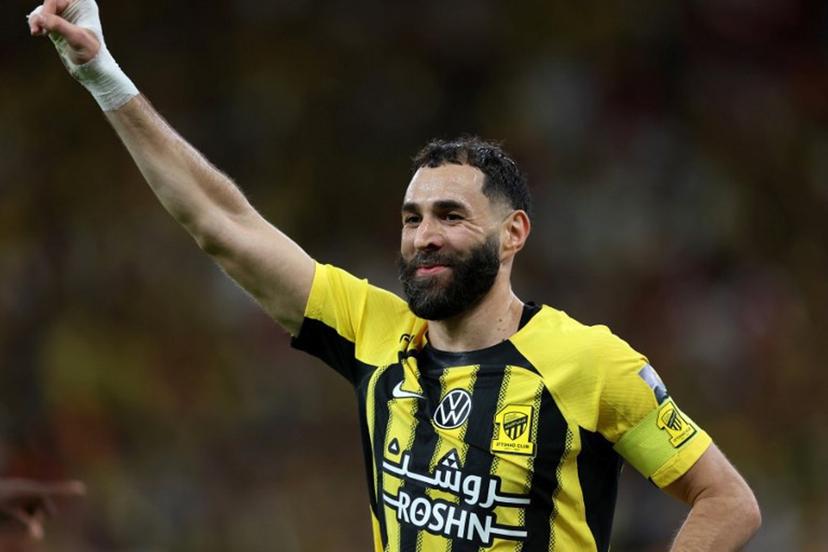 Ittihad's French forward #09 Karim Benzema reacts after scoring during the King's Cup final match between Ittihad FC and Qadsiah FC at the King Abdullah Sport City Stadium in Jeddah on May 30, 2025. Abdel Ghani BASHIR / AFP