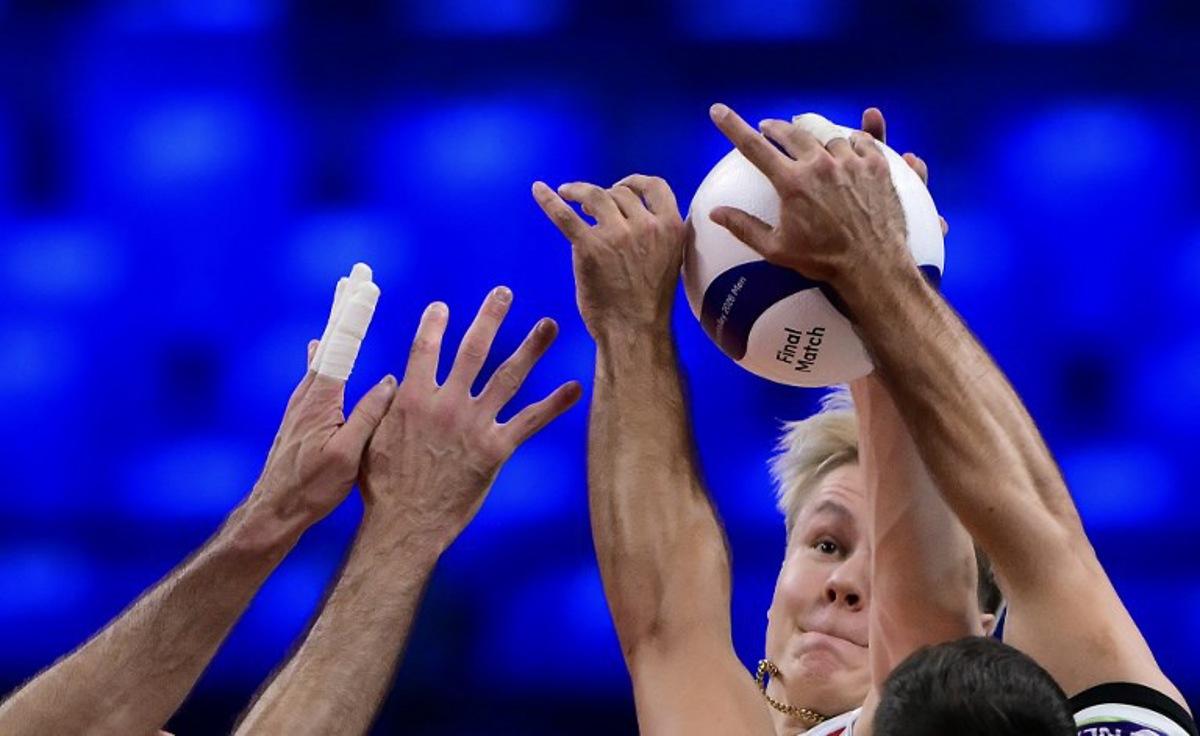 Finland's Opposite Hitter #10 Luka Marttila spikes the ball during the CEV EuroVolley 2026 men's bronze medal volleyball match final between Finland and Slovenia at the Forum of Assago, on September 26, 2026. Marco BERTORELLO / AFP